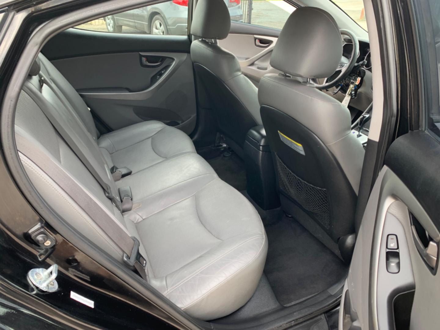 2012 Black Hyundai Elantra GLS A/T (KMHDH4AE3CU) with an 1.8L L4 DOHC 16V engine, Automatic transmission, located at 1830 North Belt Line Road, Irving, TX, 75061, (469) 524-0199, 32.834373, -96.993584 - Photo#7